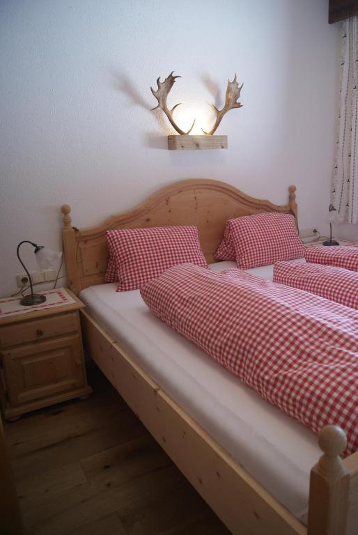 Postel nebo postele na pokoji v ubytování Bichlhof