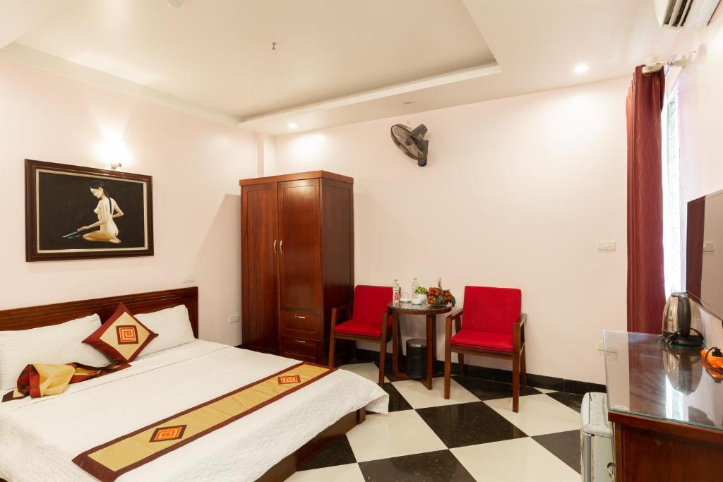 Postel nebo postele na pokoji v ubytování Titanic 2 Hotel
