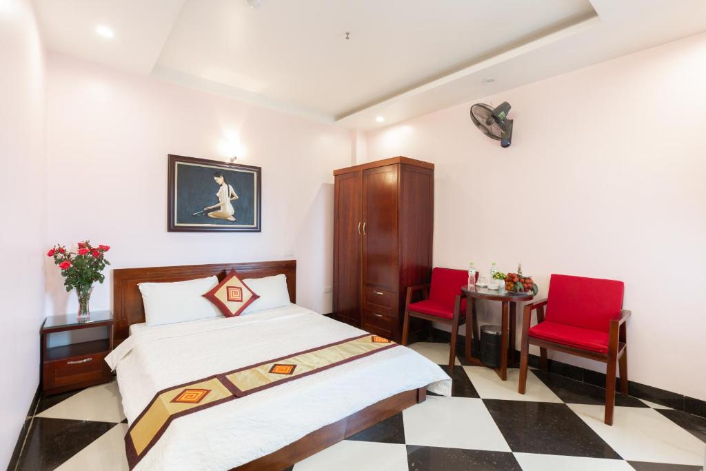 Postel nebo postele na pokoji v ubytování Titanic 2 Hotel