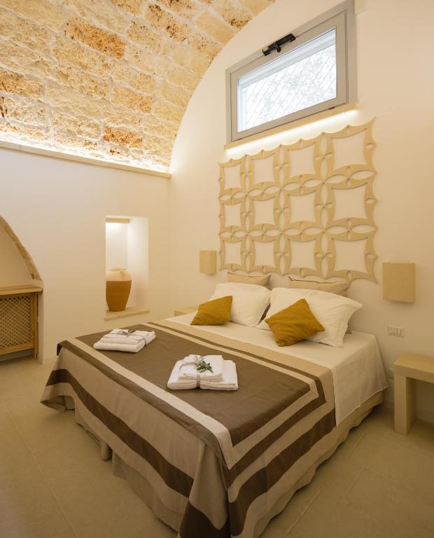 Postel nebo postele na pokoji v ubytování Casa Litarà