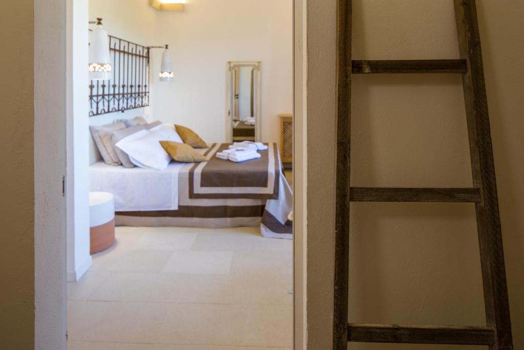 Postel nebo postele na pokoji v ubytování Casa Litarà