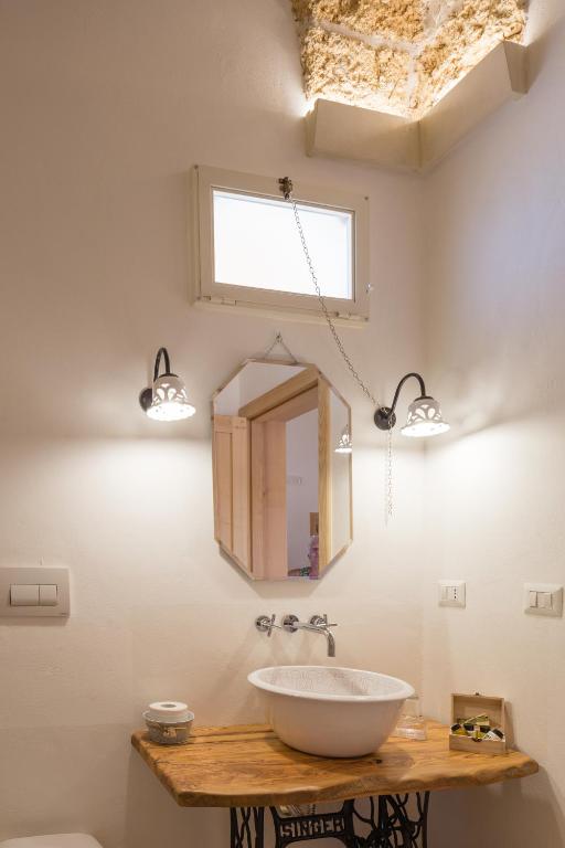 Koupelna v ubytování Casa Litarà