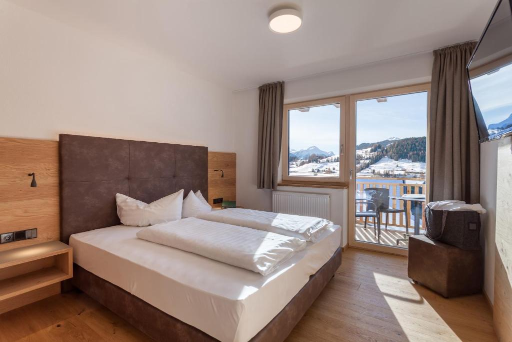 Posteľ alebo postele v izbe v ubytovaní Apart-Hotel Dreisonnenhof