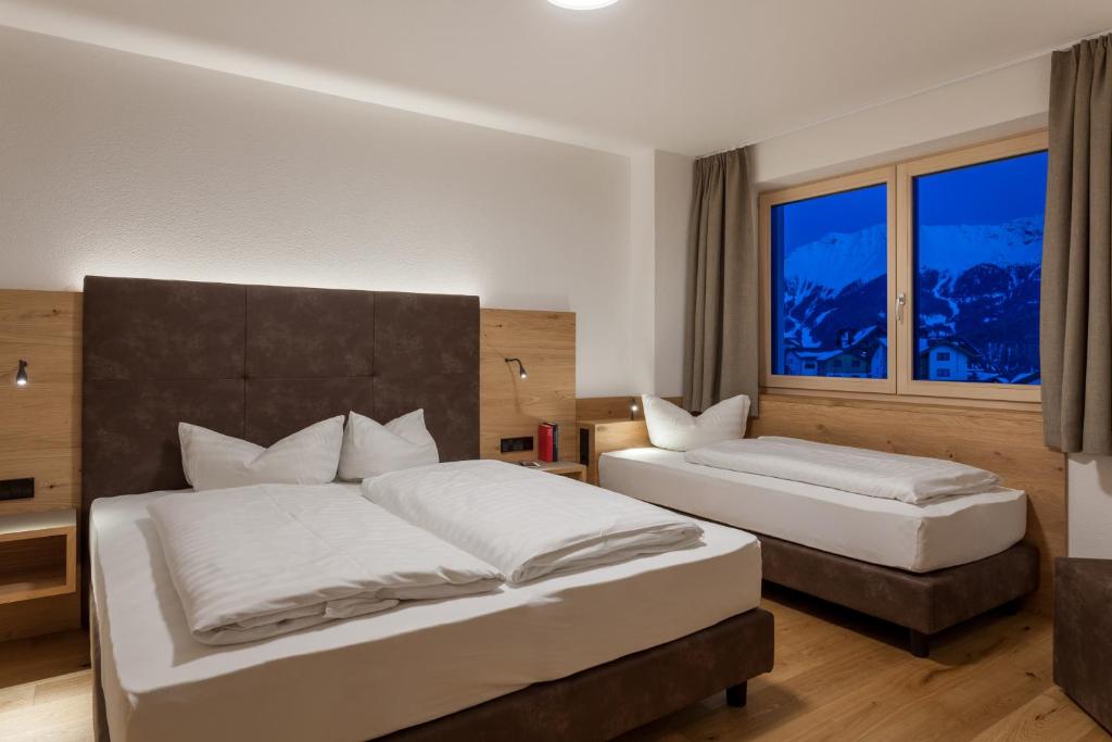 Posteľ alebo postele v izbe v ubytovaní Apart-Hotel Dreisonnenhof