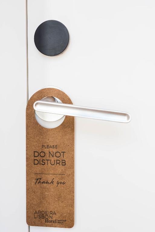 a sign that says do not disturb that says thank you at Aroeira Lisbon Hotel - Sea & Golf in Aroeira