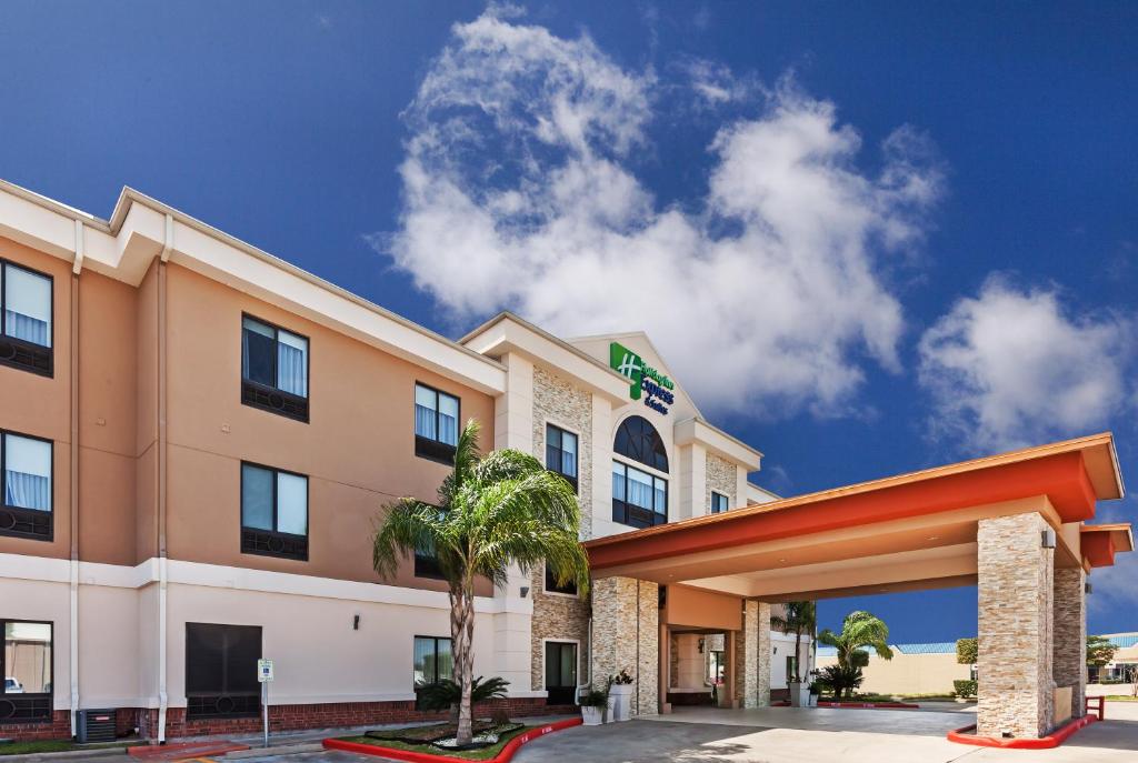 a rendering of a hotel with a building at Holiday Inn Express & Suites Houston East, an IHG Hotel in Houston