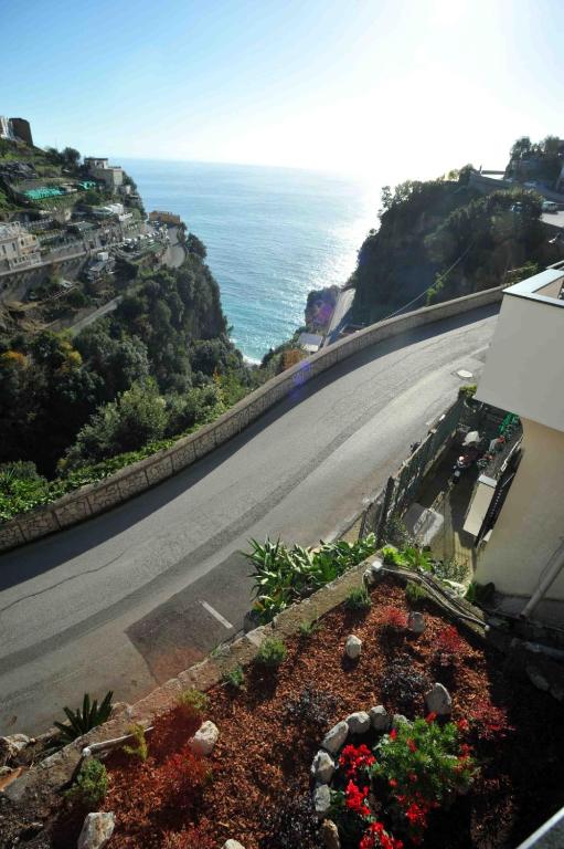 an empty road with a view of the ocean at Matteo's House B&b in Amalfi