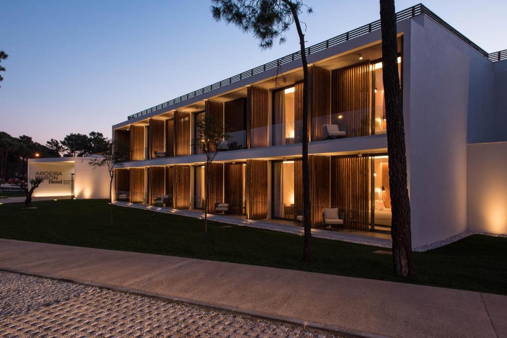 a building with a lot of windows at Aroeira Lisbon Hotel - Sea & Golf in Aroeira