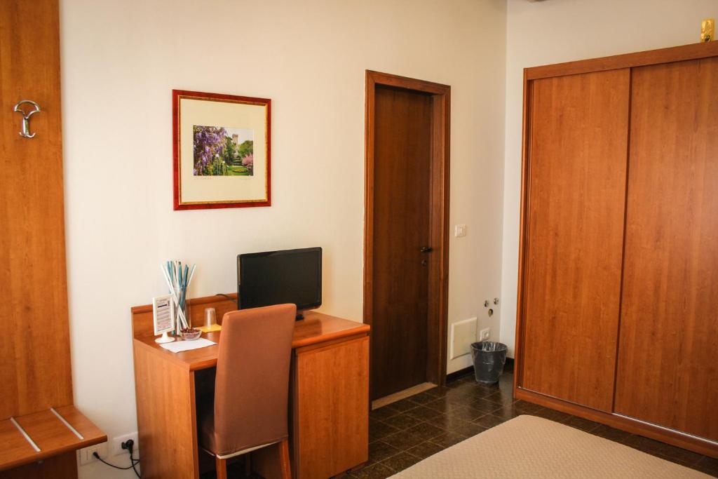 TV a/nebo společenská místnost v ubytování Hotel Centrale