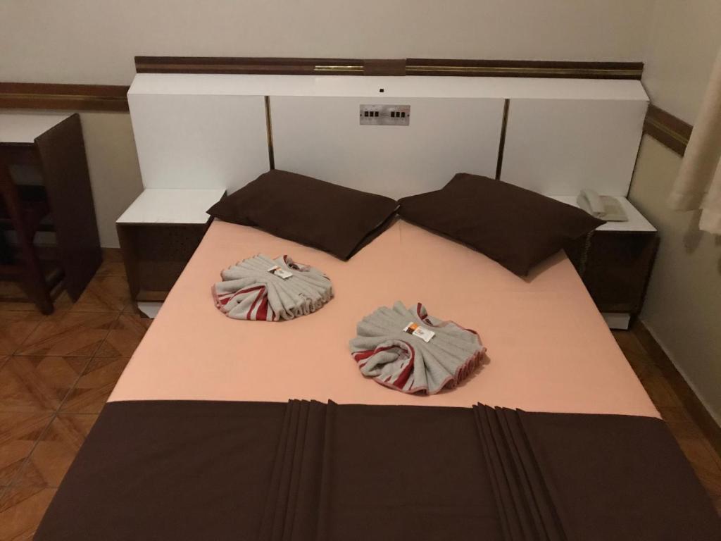 Postel nebo postele na pokoji v ubytování Hotel Charlly