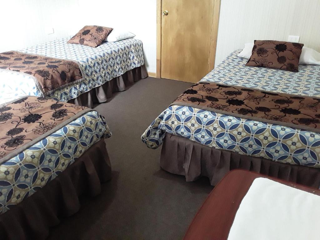 Postel nebo postele na pokoji v ubytování Hostal Don Pedro