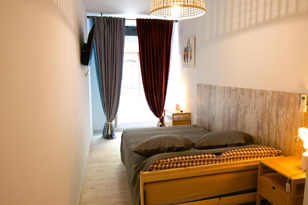 Postel nebo postele na pokoji v ubytování Loft Valentia Tous Calpe