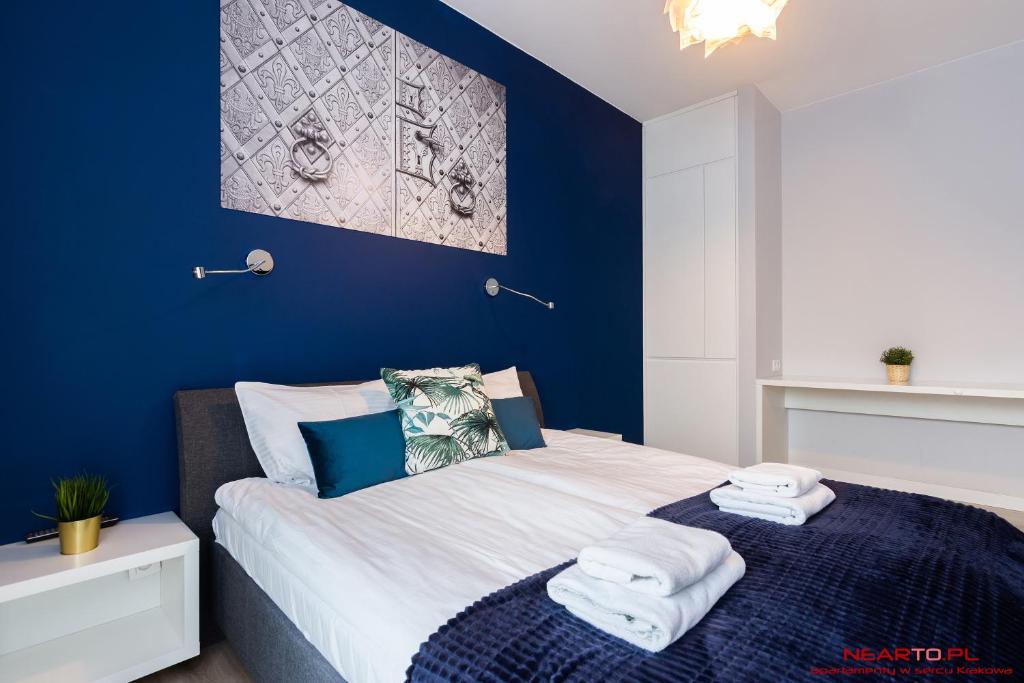 Posteľ alebo postele v izbe v ubytovaní Apartments Nearto Old Town Rakowicka