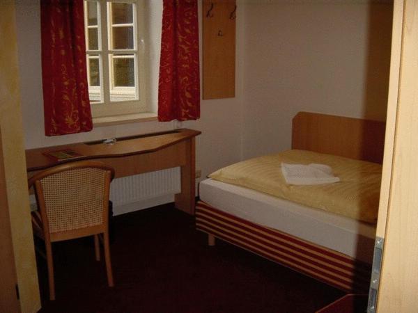 Voodi või voodid majutusasutuse Hotel Weidenmühle toas