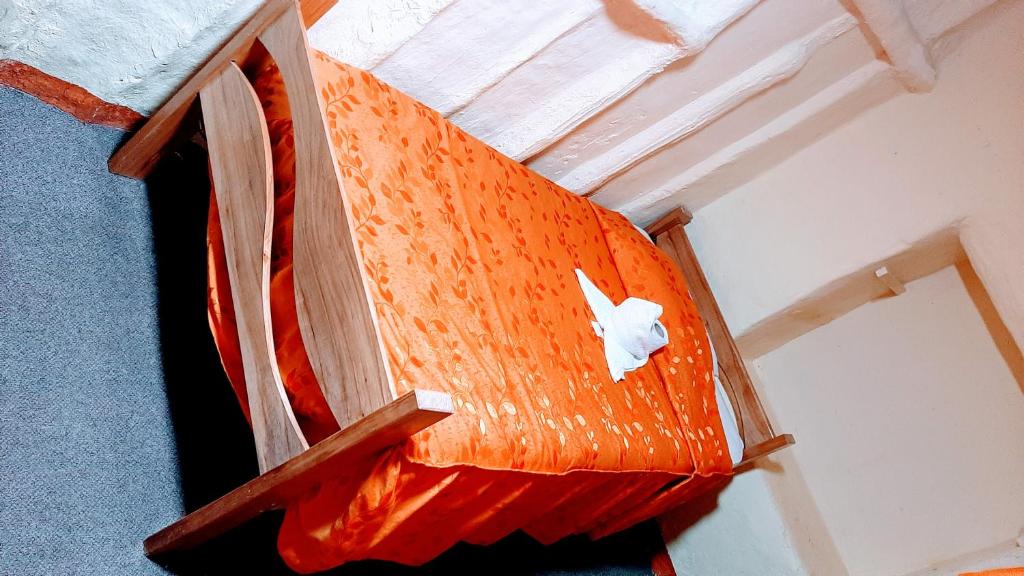Postel nebo postele na pokoji v ubytování Hostal sambleño cusco Piero suite