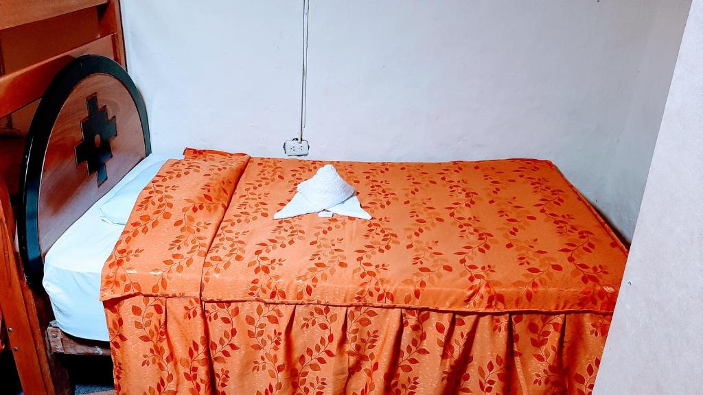Postel nebo postele na pokoji v ubytování Hostal sambleño cusco Piero suite