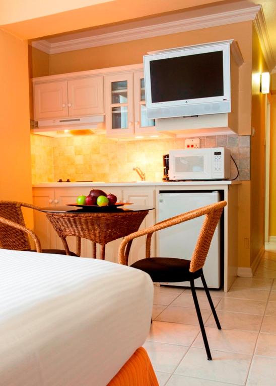 A cozinha ou kitchenette de Kapok Hotel