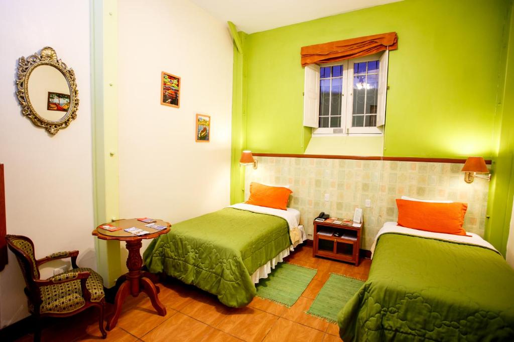 Cama o camas de una habitación en Lima Wari Hotel Boutique