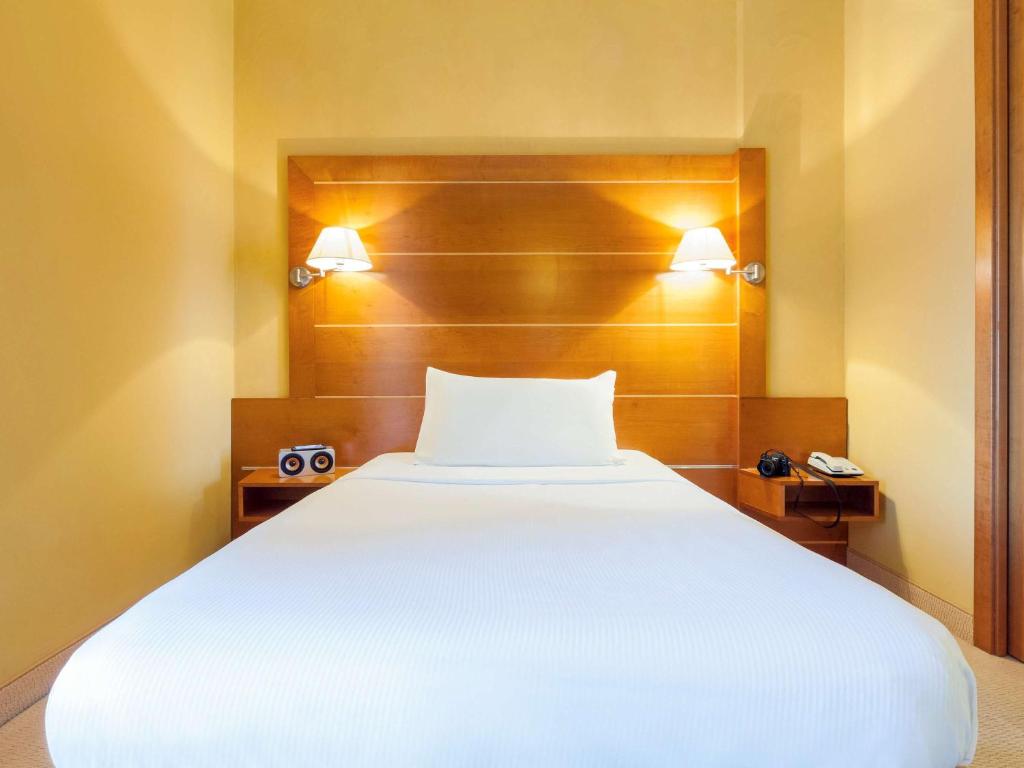 Postel nebo postele na pokoji v ubytování Ibis Styles Bari Giovinazzo