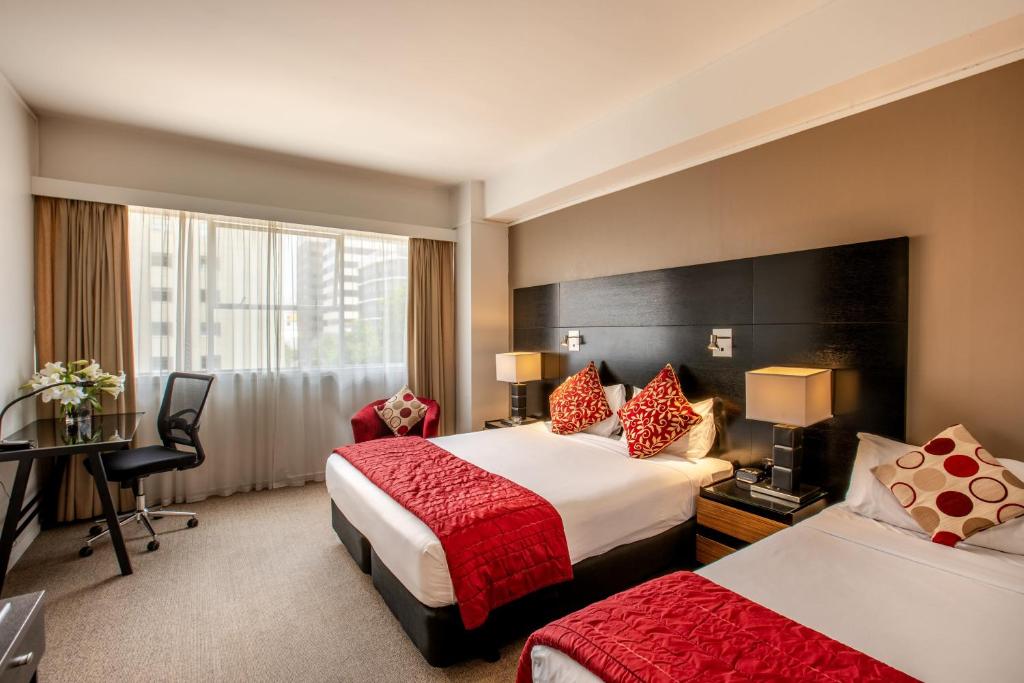 Postel nebo postele na pokoji v ubytování Mercure Wellington Abel Tasman