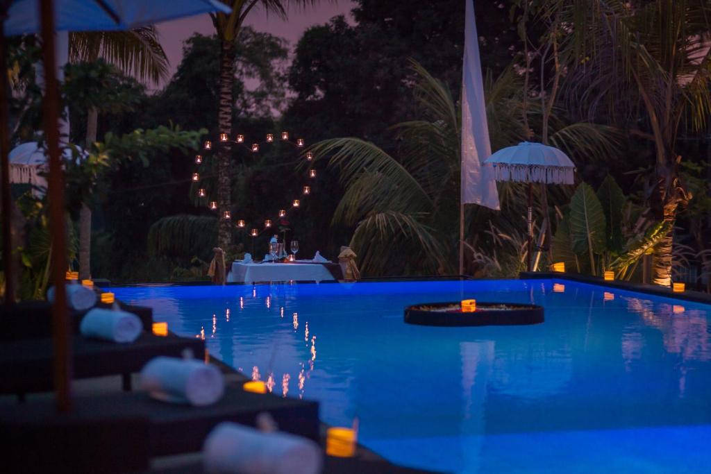 The swimming pool at or close to Bubu Suite by Prasi