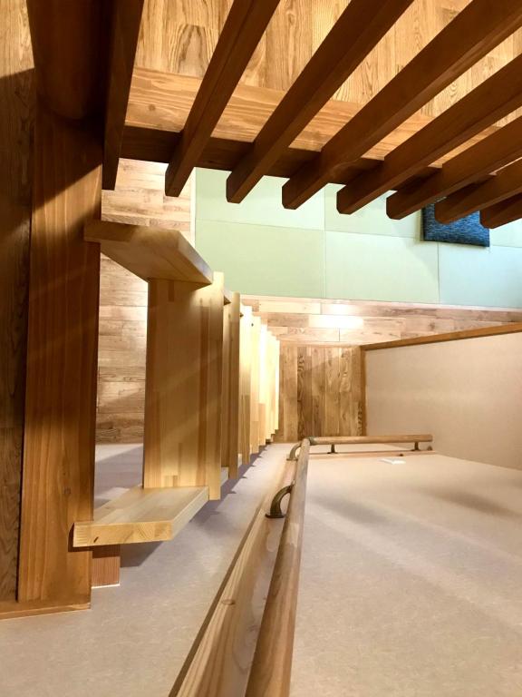 Postel nebo postele na pokoji v ubytování Nozawa Onsen Utopia