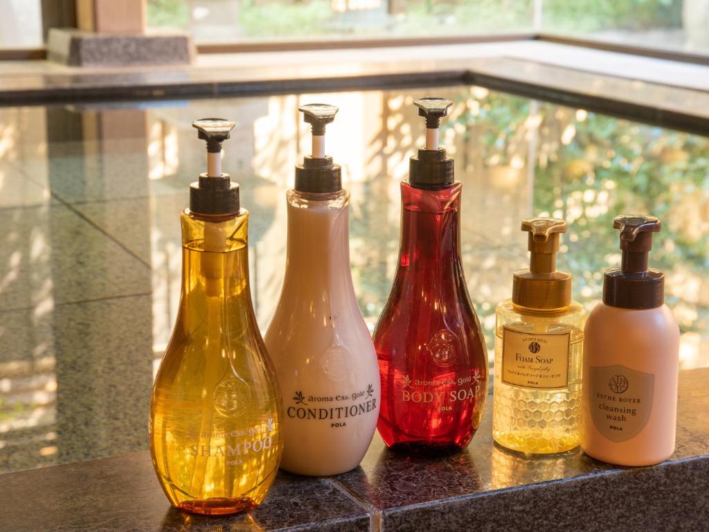 a group of four bottles sitting on a table at Hotel Hagoromo in Shizuoka