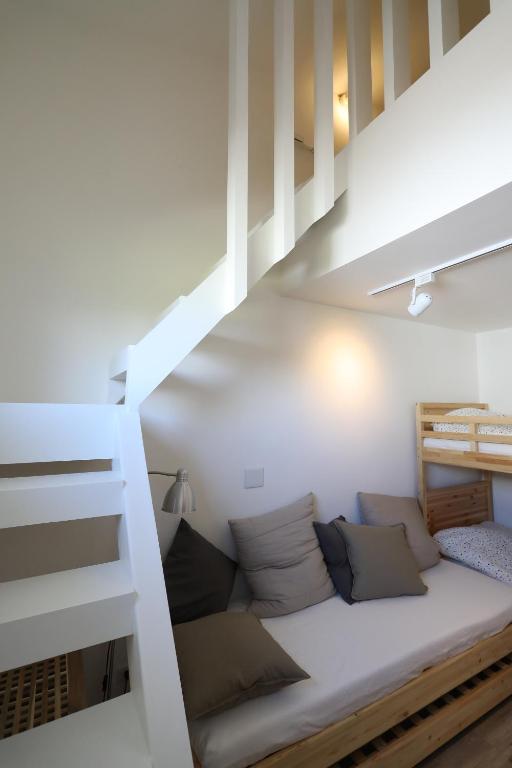Postel nebo postele na pokoji v ubytování Dongshan Yi Hostel