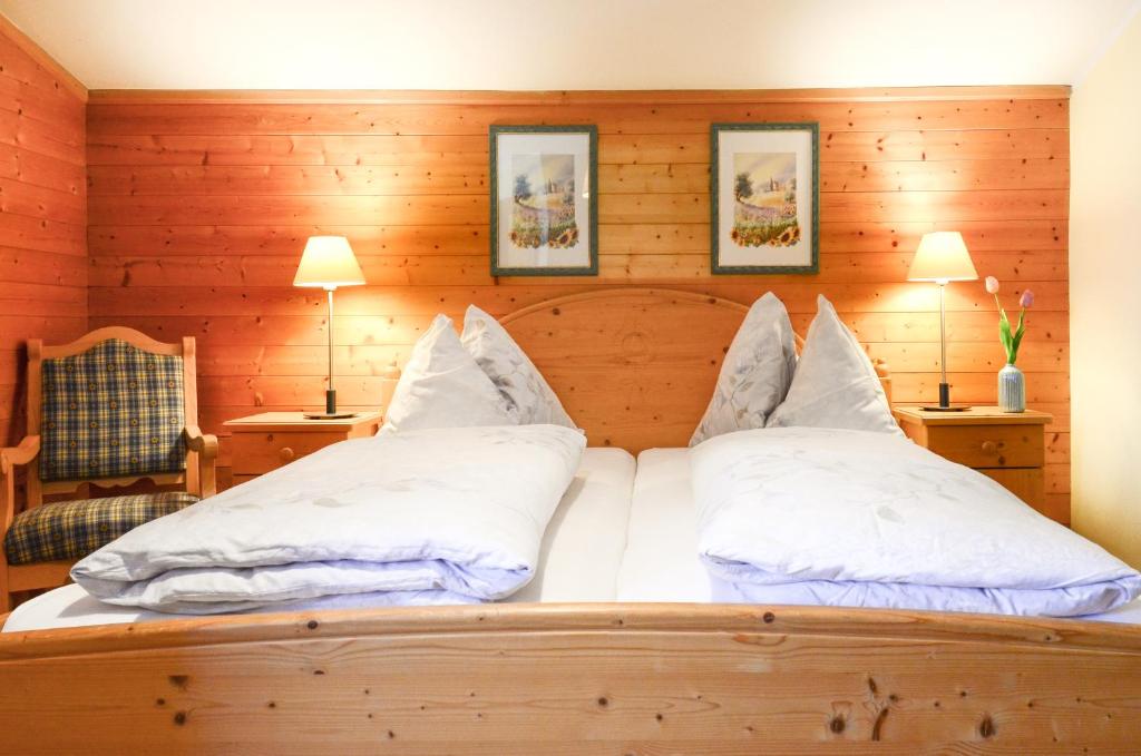 Postel nebo postele na pokoji v ubytování Ferienhaus Schnitzhof