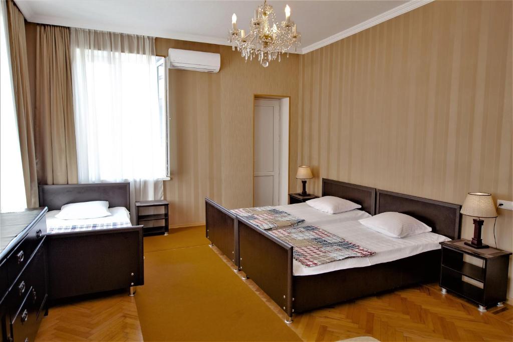 Postel nebo postele na pokoji v ubytování Tinikos Guest House