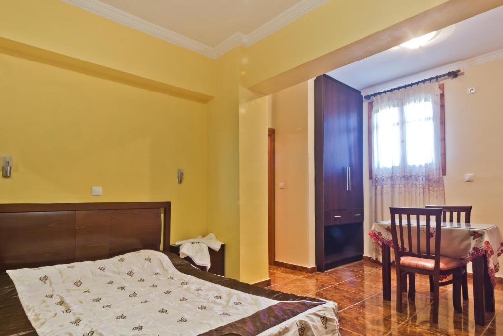 Postel nebo postele na pokoji v ubytování Montemar Studios & Apartments