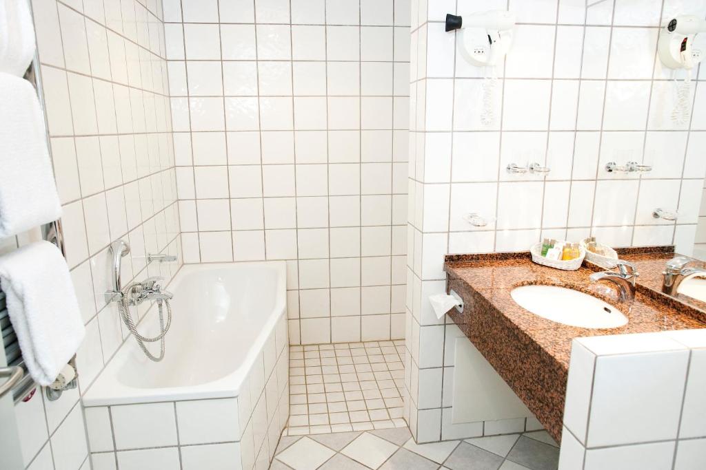 Koupelna v ubytování Hotel Knudsens Gaard