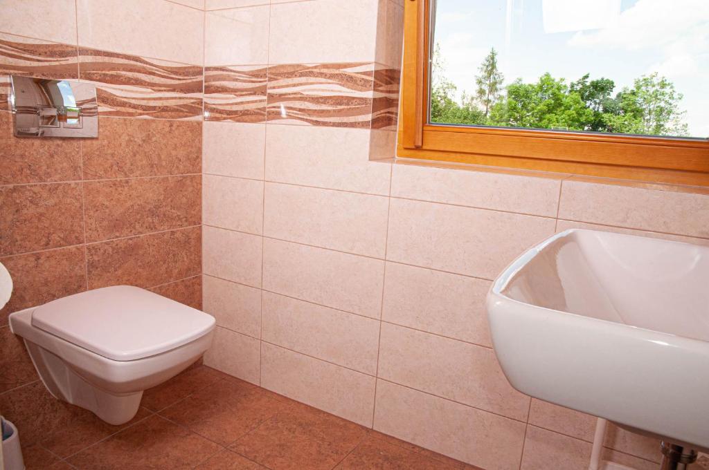 Kúpeľňa v ubytovaní Willa Pod Nosalem II