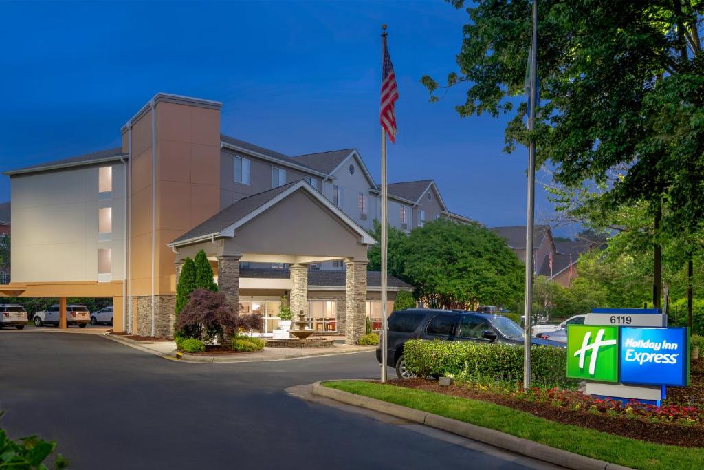 a for lease sign in front of a building at Holiday Inn Express Chapel Hill, an IHG Hotel in Chapel Hill