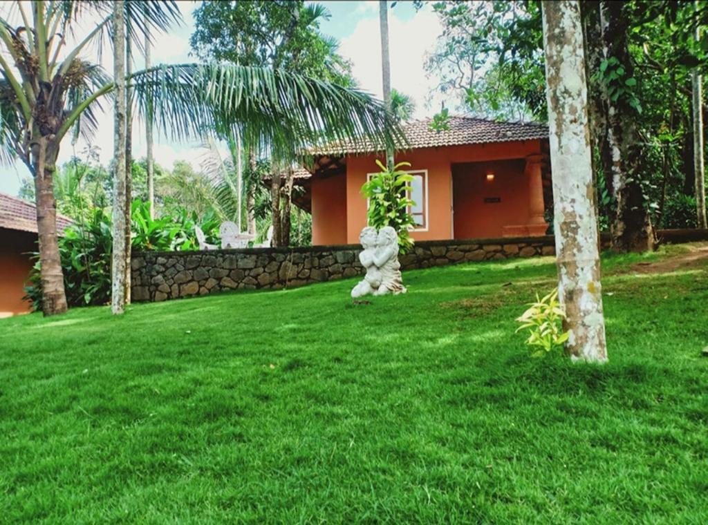 Zahrada ubytování Indeevara Luxury Resort and Spa, Wayanad