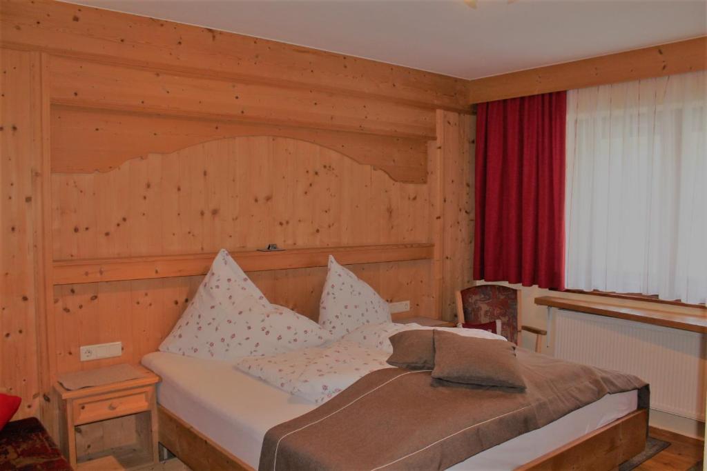 Postel nebo postele na pokoji v ubytování Appartements Griesserhof
