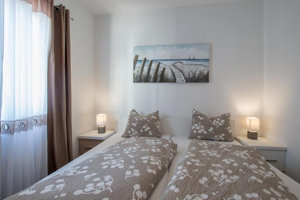 Posteľ alebo postele v izbe v ubytovaní LAVANDA house with apartments