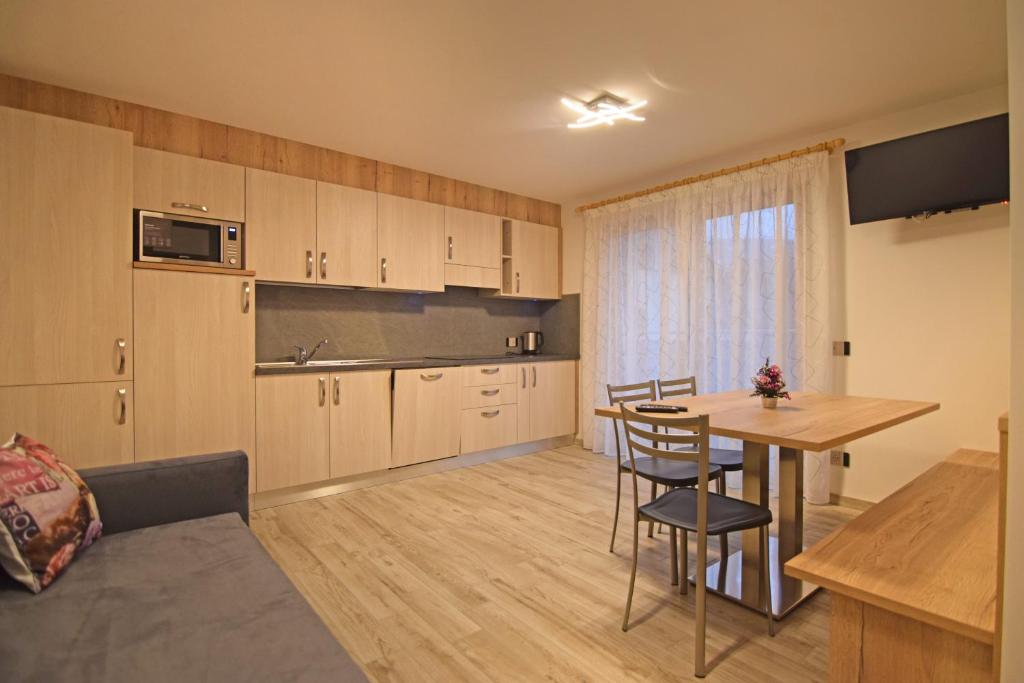 Kuchyň nebo kuchyňský kout v ubytování casa vacanze arcobaleno
