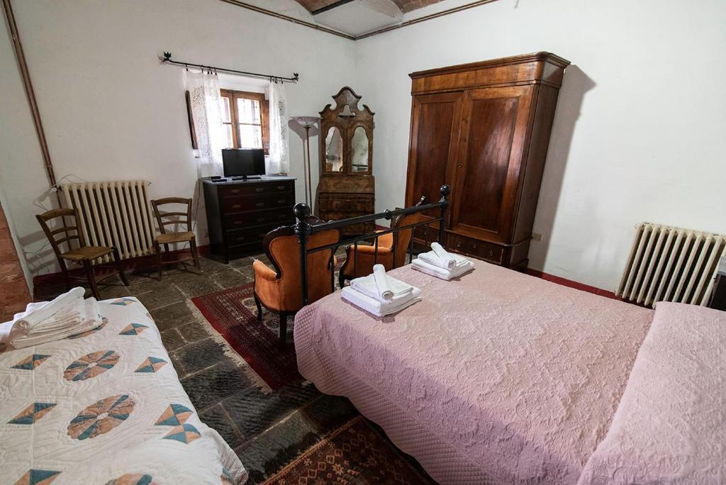 Posteľ alebo postele v izbe v ubytovaní Agriturismo La Fontaccia
