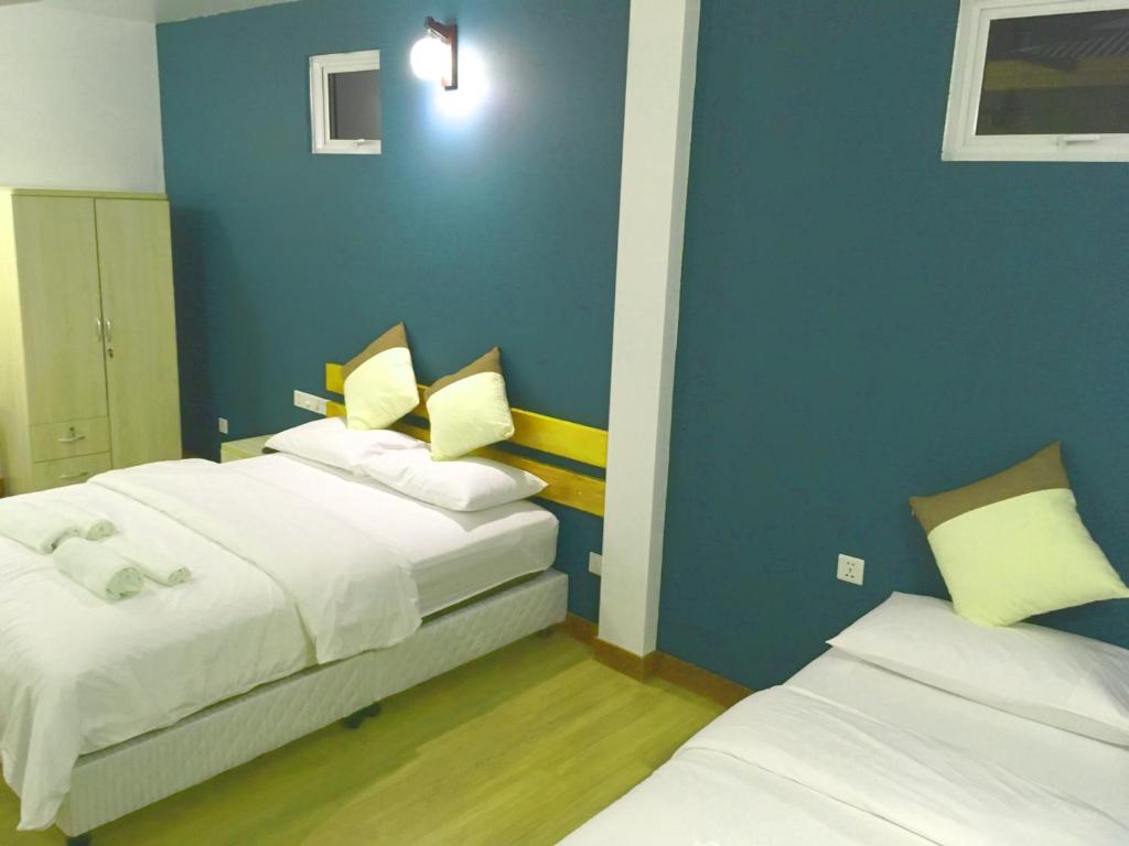 Postel nebo postele na pokoji v ubytování Acqua Blu Rasdhoo