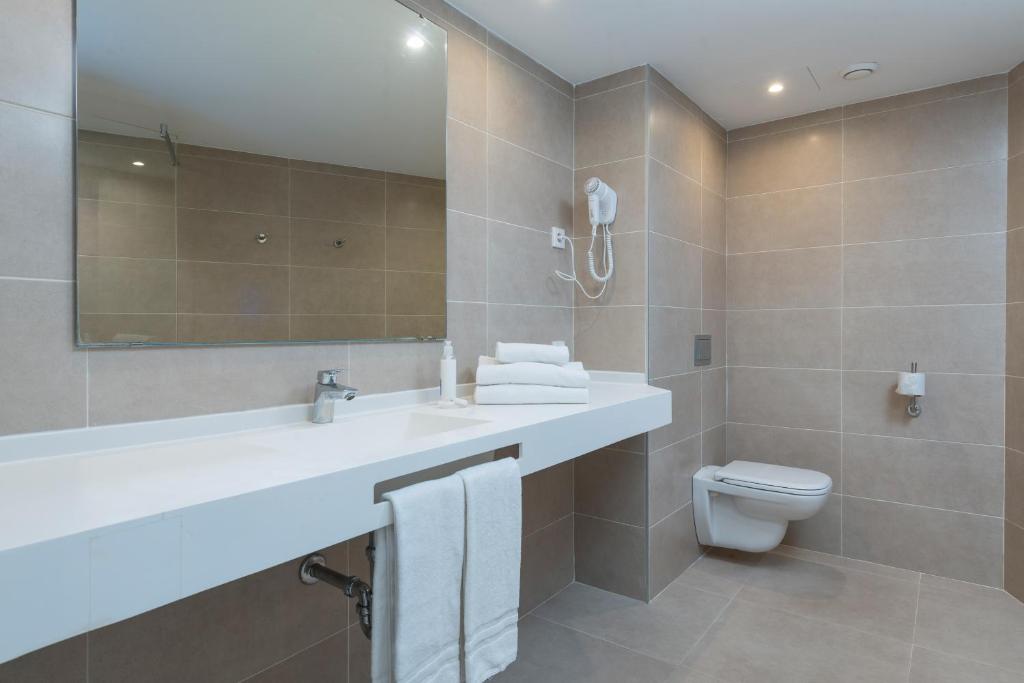 Ванная комната в Aparthotel Ses Fotges