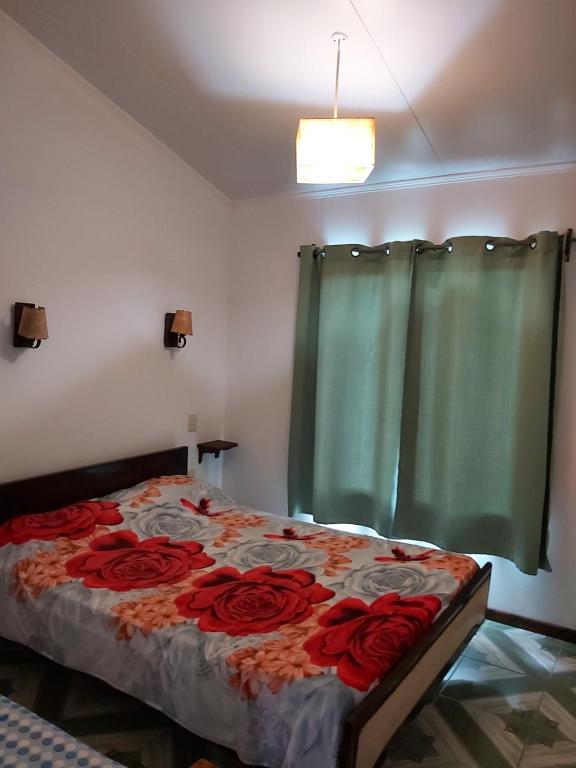 Postel nebo postele na pokoji v ubytování Cabañas San Jorge