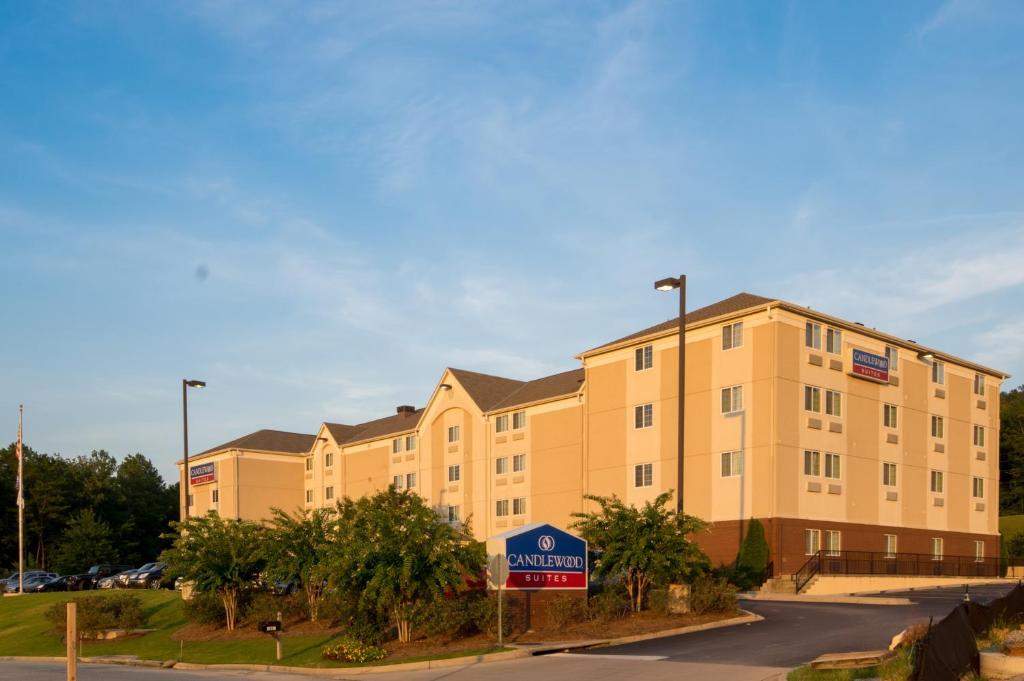 a large building with a large window on the side of the building at Candlewood Suites Alabaster, an IHG Hotel in Alabaster
