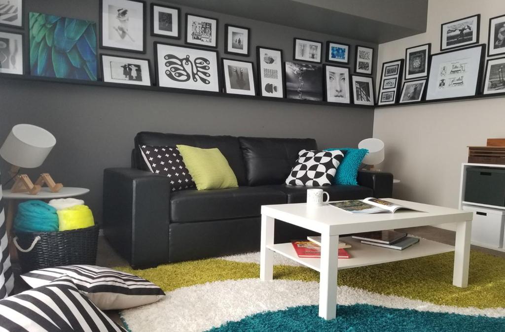 a living room with a couch and a table at Ferny Hill Retreat, Emerald Victoria in Emerald