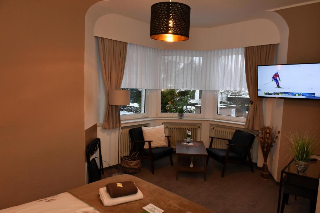 TV a/nebo společenská místnost v ubytování Hotel Wappenhof