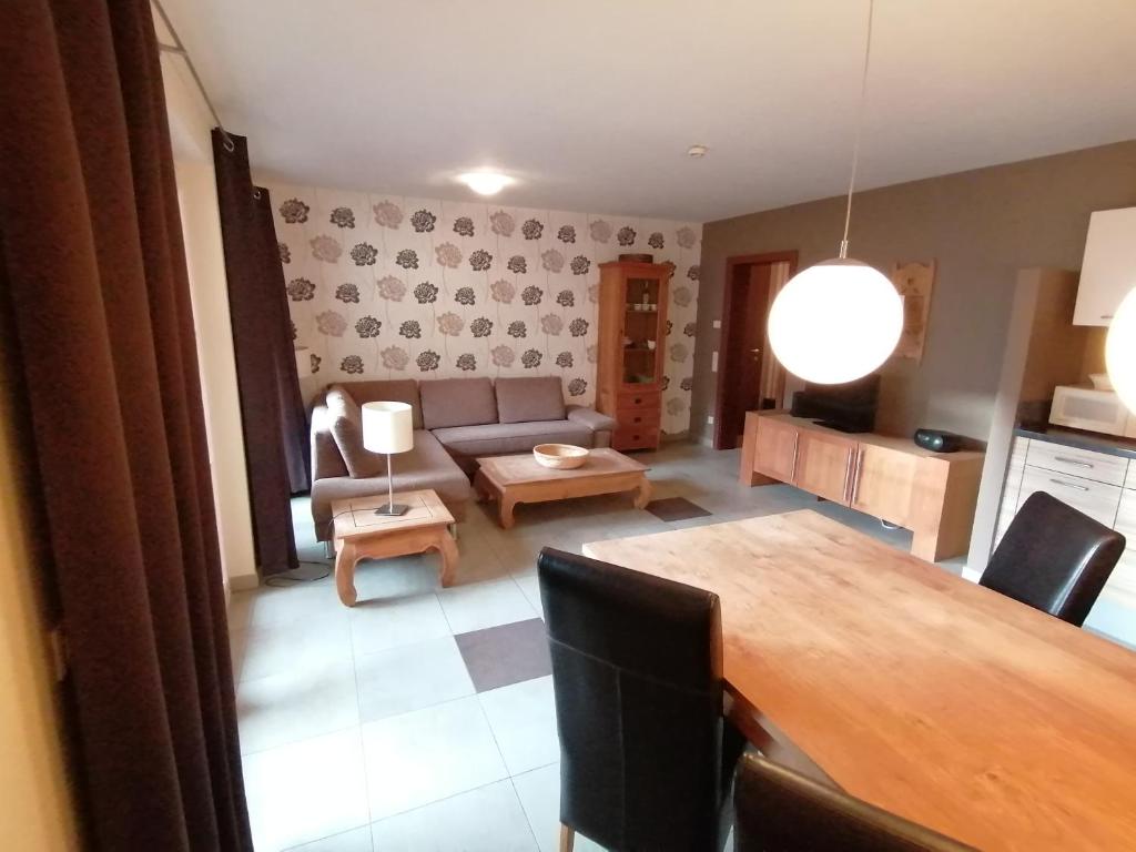 Posedenie v ubytovaní Komfort Appartements serviced by Auhof