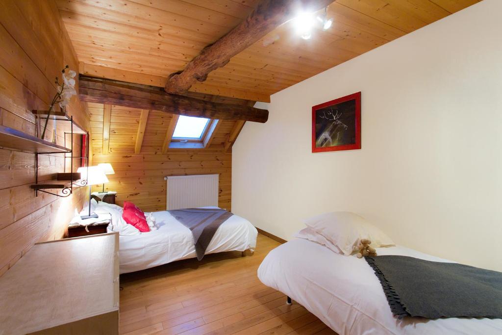 Postel nebo postele na pokoji v ubytování Chalet Les Copains