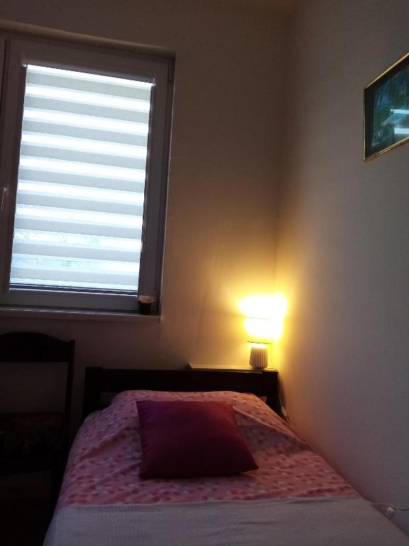 Postel nebo postele na pokoji v ubytování Vila I