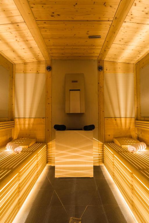 a wooden room with two beds in it at Royal Palm Resort & Spa - Adults Only in Playa Jandia