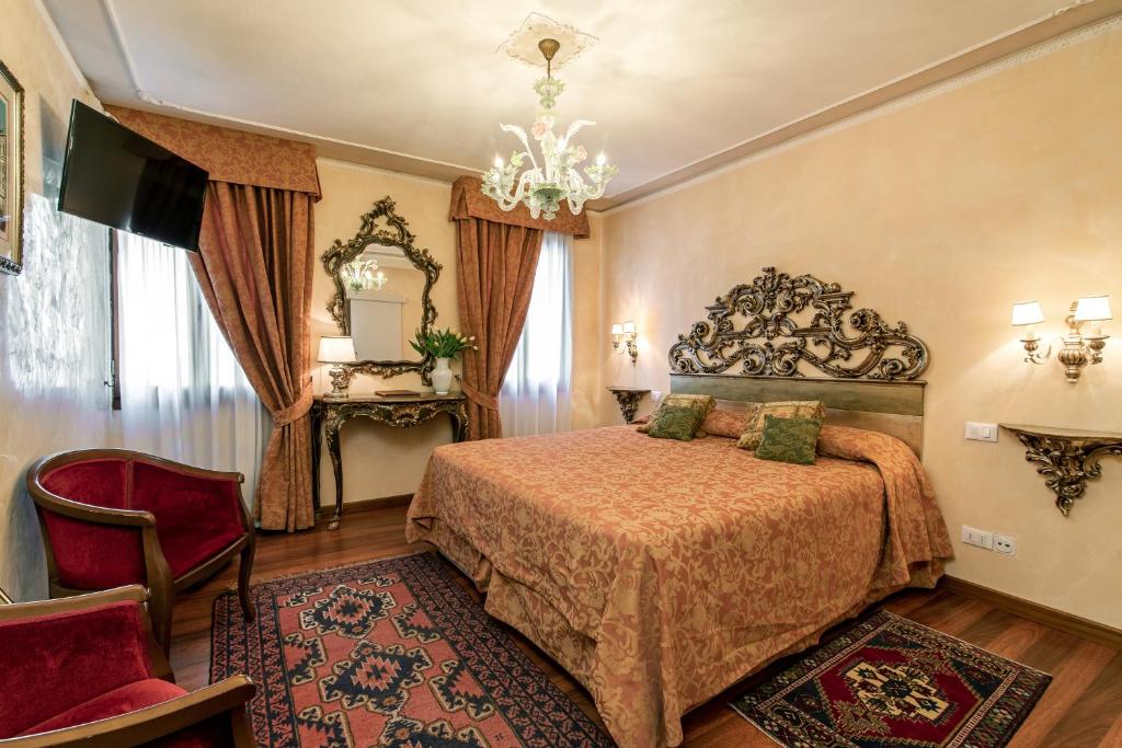 Hotel Bel Sito e Berlinoにあるベッド